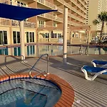 Brightly Furnished Beachfront Condominium By Brightwild