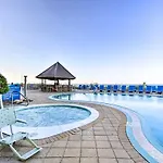 Beachfront Condo With Emerald Beach Resort Amenities