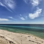 Beachfront Condo With Emerald Beach Resort Amenities