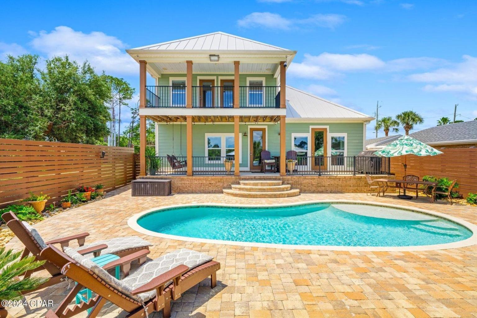Holiday home Dancin On The Waves On Lagoon Boat Dock, Pool, Firepit